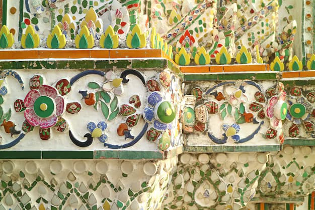Wat Arun central prang porcelain tile detail close up Bangkok temple architecture Thailand