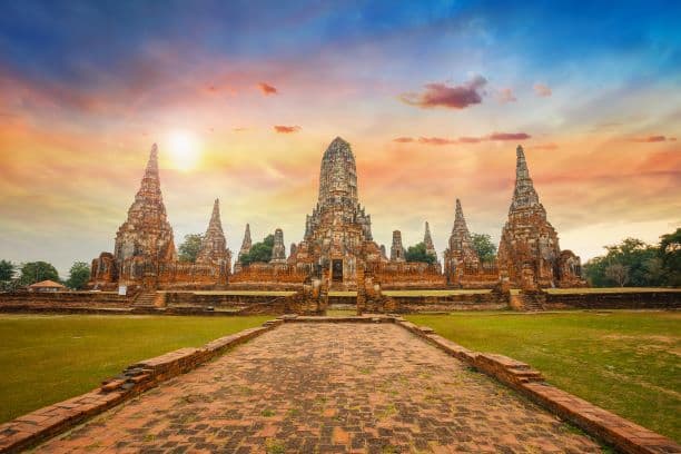 Wat Chaiwatthanaram sunset reflection Chao Phraya River Ayutthaya Thailand private tour from Bangkok golden hour