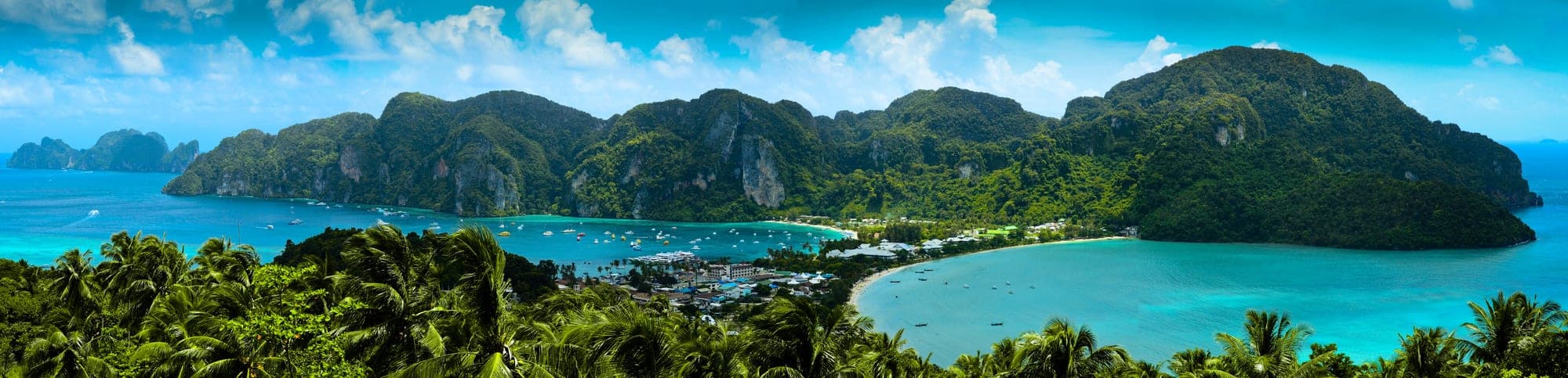 Phi Phi Island turquoise water and limestone cliffs on a Phuket island hopping day trip