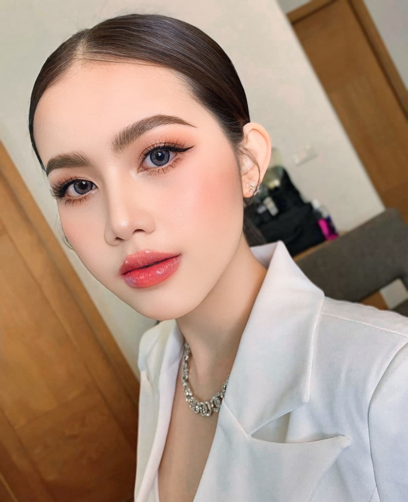 Thai costume makeup and hairstyling example at a Wat Arun costume studio