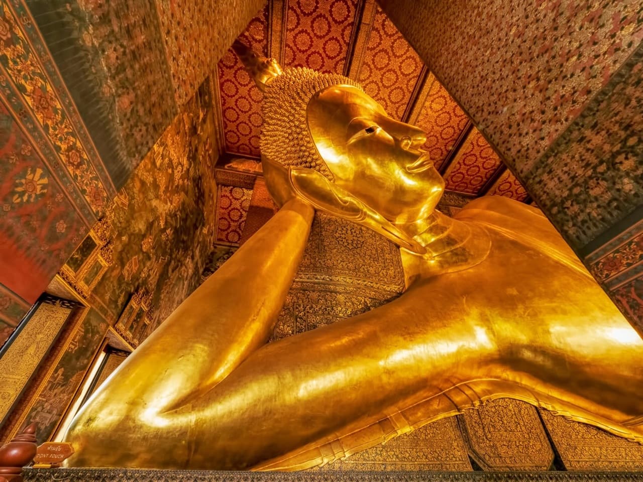Reclining Buddha Wat Pho Bangkok Thailand gold statue