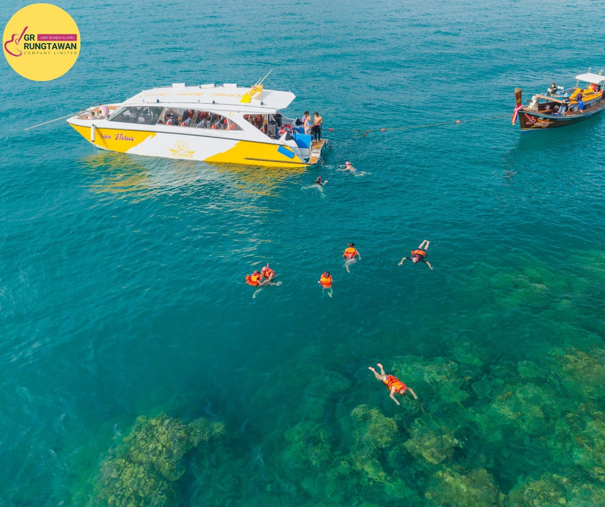 Krabi Phi Phi Island speedboat tour 2026 — Phi Phi speedboat crossing the turquoise Andaman water towards Maya Bay