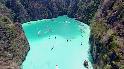 Pileh Lagoon Phi Phi — turquoise water enclosed by 100m limestone cliffs on the Krabi speedboat tour