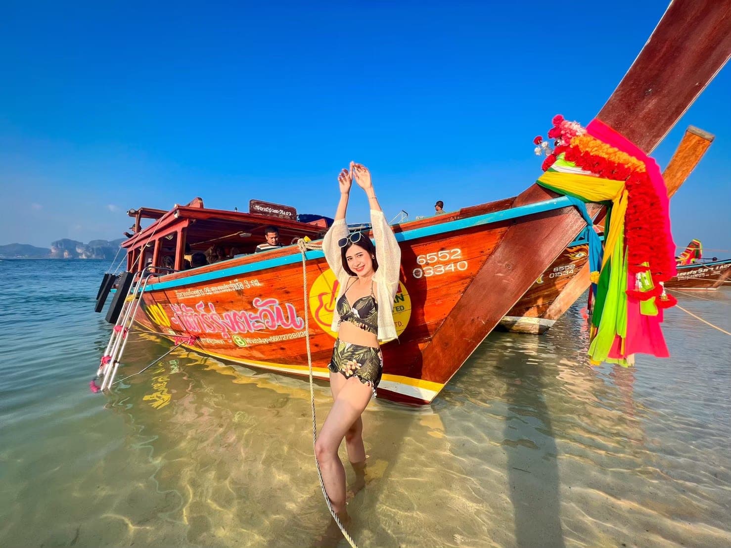 Krabi 4 Island Tour 2026 — Andaman Sea limestone karst islands viewed from the speedboat, Ao Nang