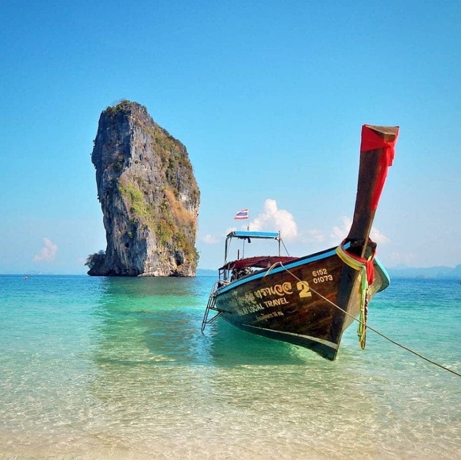 Poda Island Koh Poda Krabi — white sand beach with turquoise water and limestone karst islands offshore