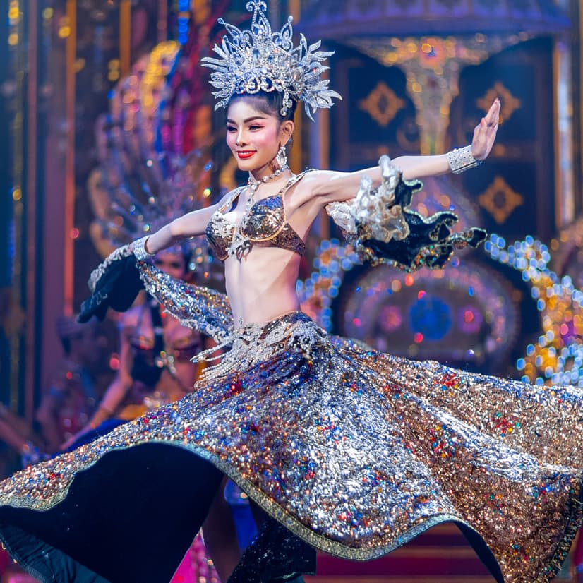 Alcazar Cabaret Pattaya performers in traditional Thai classical dance costume on stage