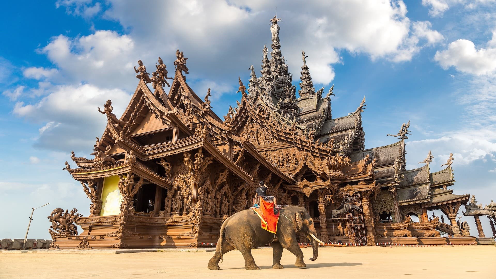 Sanctuary of Truth carved teak details — Ayutthaya-era joinery with no nails or metal
