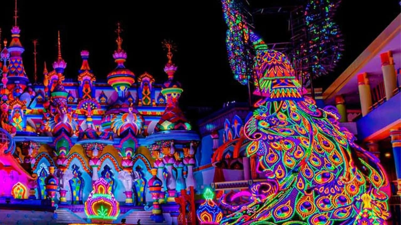 Carnival Magic Phuket giant LED light sculptures at the park entrance evening Kamala