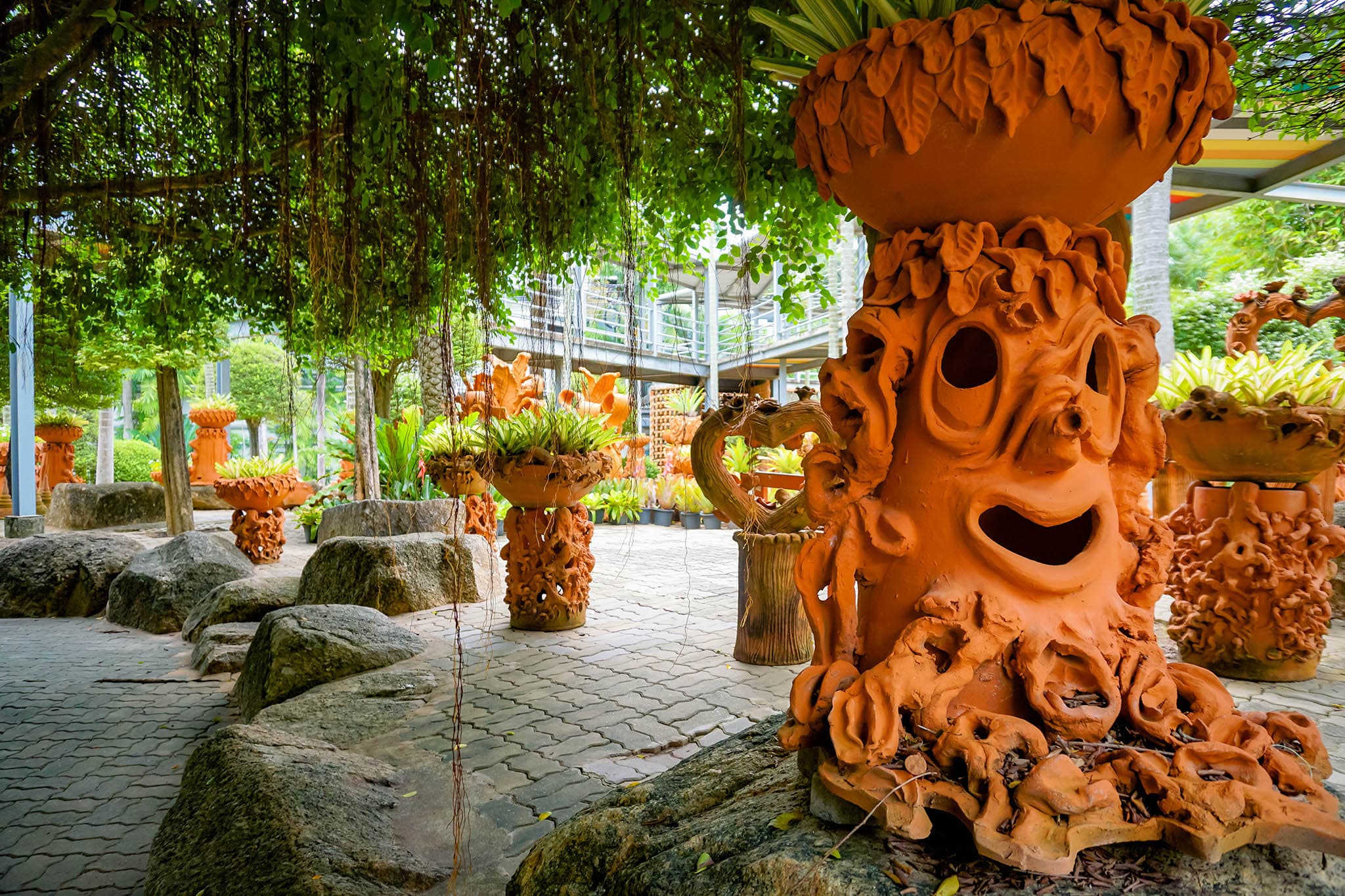 Nong Nooch Pattaya Stonehenge replica and pottery garden among tropical plant collections