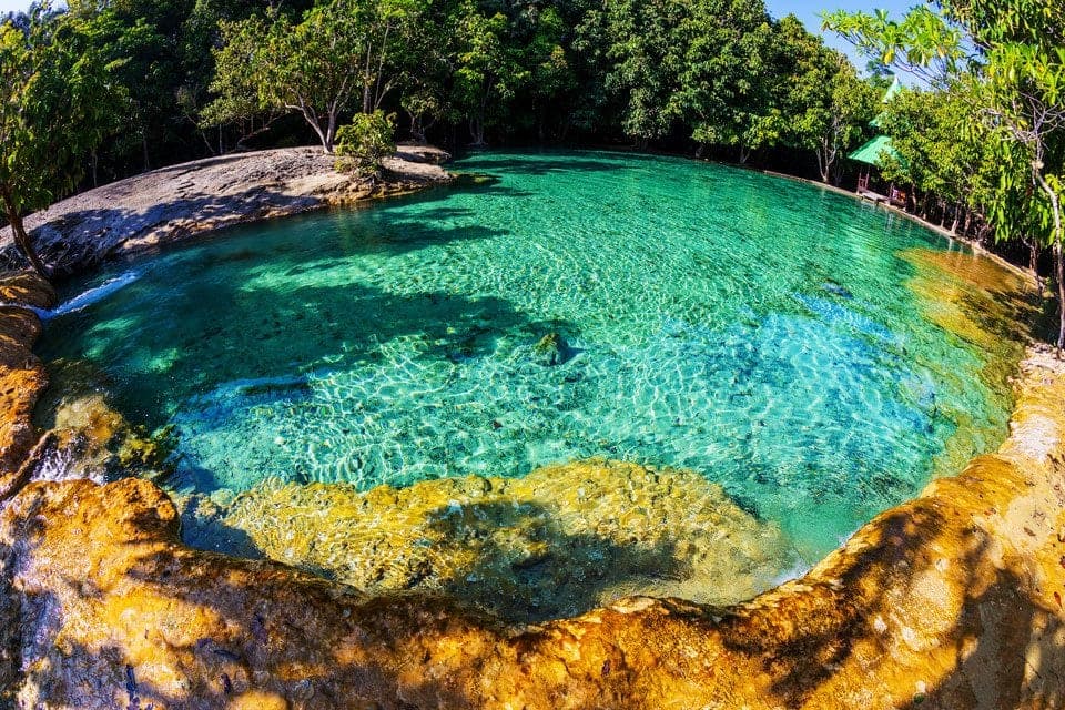 Emerald Pool Sa Morakot Krabi — turquoise travertine swimming pool inside Khao Phra Bang Khram Nature Reserve