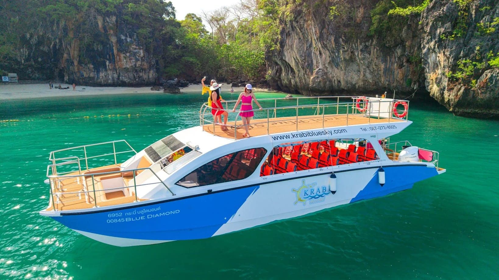 Phi Phi catamaran tour from Krabi 2026 — twin-hull power catamaran on Andaman Sea