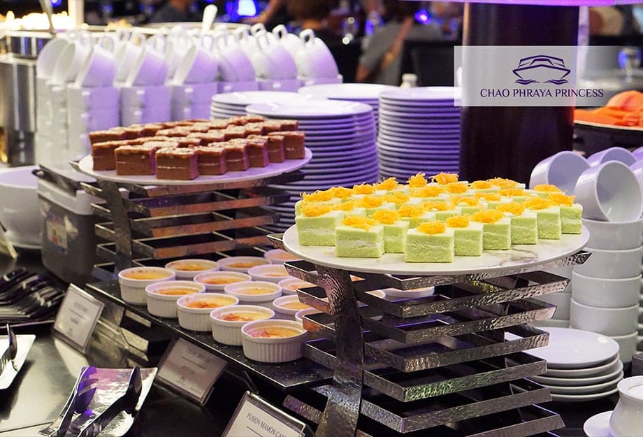 Dessert spread with panna cotta and creme brulee on the Chao Phraya Princess cruise