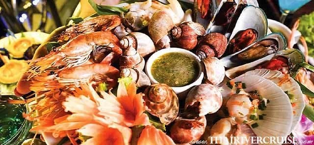 Grilled river prawns and mussels on the White Orchid River Cruise seafood buffet Bangkok