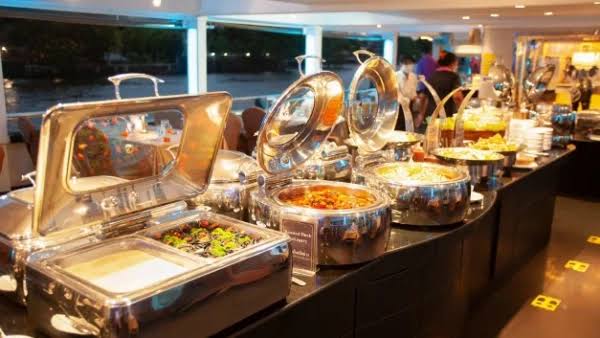 Salmon sashimi and sushi on the White Orchid River Cruise buffet Bangkok
