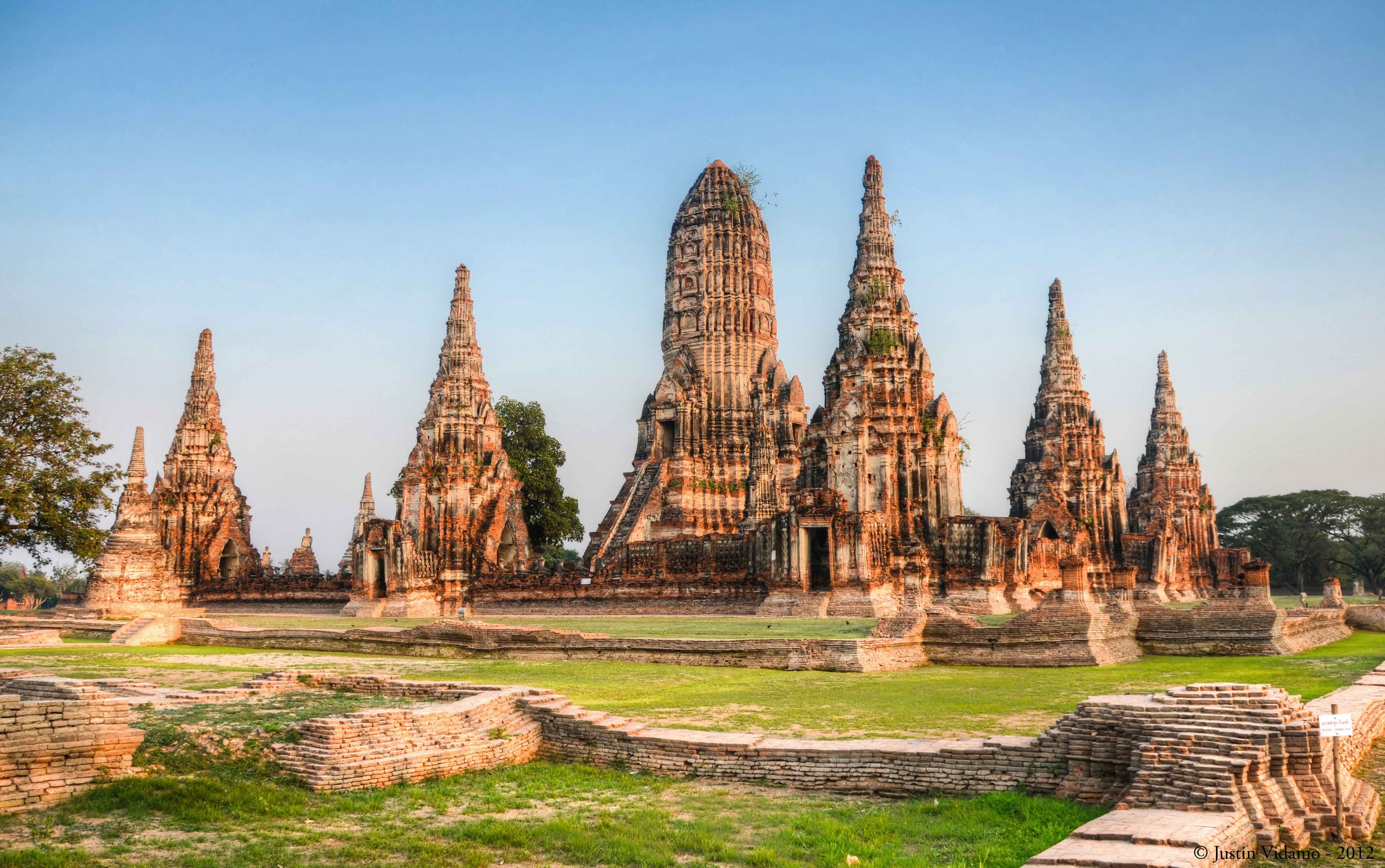 Wat Chaiwatthanaram riverside ruins Ayutthaya — dramatic sunset silhouette private tour Bangkok
