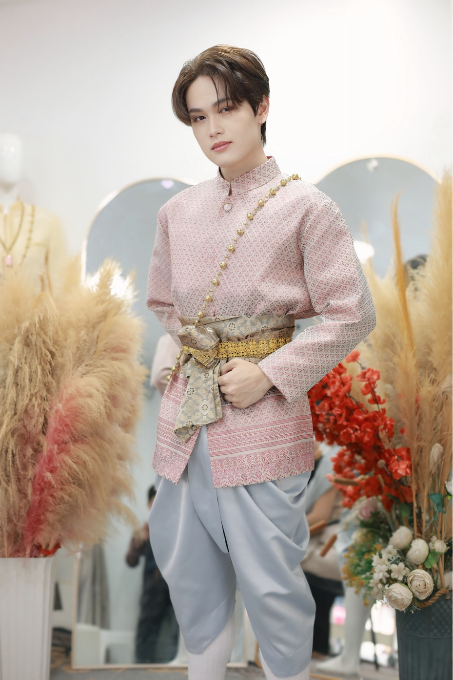 Standard tier Thai traditional costume for men with mandarin collar jacket and chong kraben trousers
